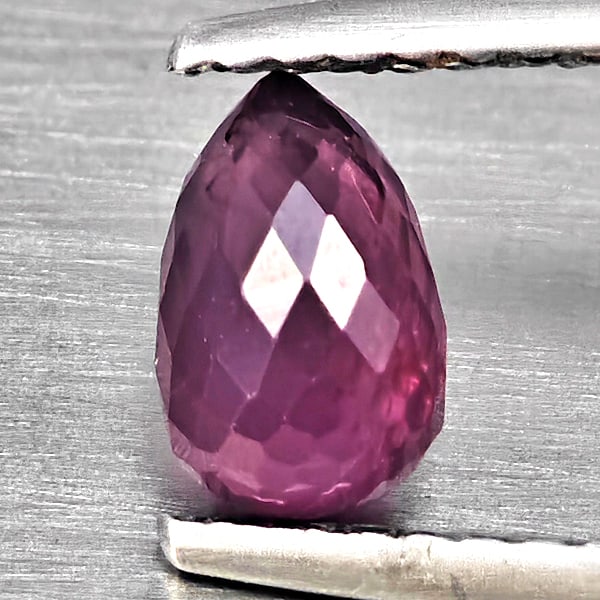 Natural Purplish Pink Rhodolite Garnet 1.12 Ct. Briolette Shape 6.4 x 4.2 Mm Gemstone From: Product ID: 802937874 Product Name: Natural Rhodolite Weight: 1.12 CT. Size: 6.4 x 4.2 MM. Shape: Briolette Color: Purplish Pink Clarity:SI1 Luster: Good Gems Origin: Madagascar Treatment: Unheated