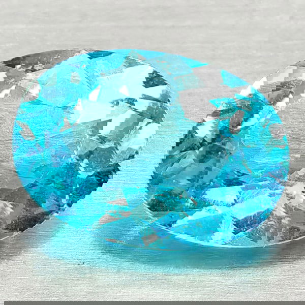 Natural Paraiba Color Apatite 0.78 Ct. Oval Shape 7.1 x 5 Mm Gemstones From Tanzania: Product ID: 800613675 Product Name: Natural Apatite Weight: 0.78 CT. Size: 7.1 x 5 x 3.1 MM. Shape: Oval Color: Neon Blue Clarity:VSI Luster: Good Gems Origin: Tanzania Treatment: Unheated Crystal Str