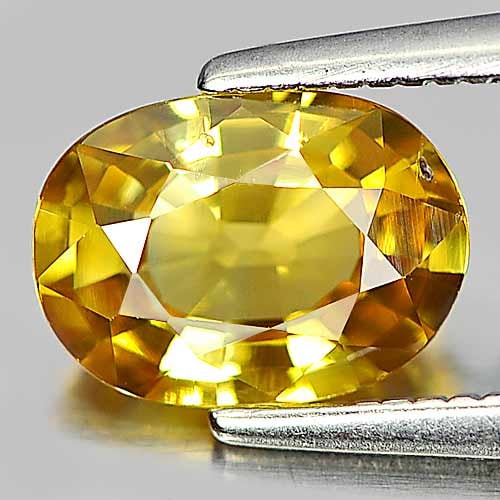 Natural Yellow Sapphire 1.41 Ct. Oval Shape 8.1 x 5.9 Mm. Gemstone From Thailand: Product ID: 806151524 Product Name: Natural Yellow Sapphire Weight: 1.41 CT. Size: 8.1 x 5.9 x 3.4 MM. Shape: Oval Color: Yellow Clarity:VSI Luster: Good Gems Origin: Thailand Treatment: Heated Crysta