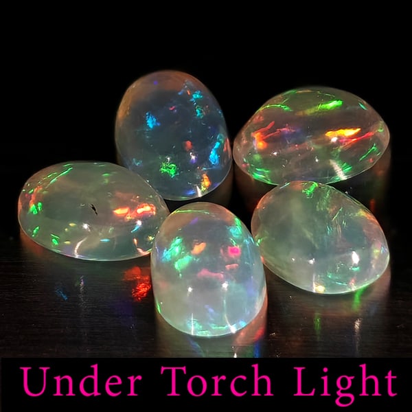 Natural Multi Color Opal 1.53 Ct. 5 Pcs Oval Cabochon Shape 6.1 x 4.1 Mm Gemstones From Ethiopia: Product ID: 818728107 Product Name: Natural Opal Weight: 1.53 CT. Size: 6.1 x 4.1 x 2.6 MM. Shape: Oval Cabochon Color: Multi-Color Clarity:Semi - Transparent Luster: Good Gems Origin: Ethiopia Treatm
