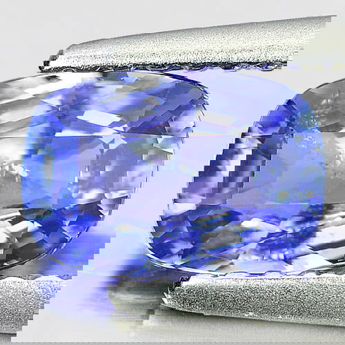 Natural Violetish Blue Tanzanite 1.00 Ct. Cushion Shape 7.2 x 5 Mm Gemstone From Tanzania: Product ID: 807005789 Product Name: Natural Tanzanite Weight: 1.00 CT. Size: 7.2 x 5 x 3.4 MM. Shape: Cushion Color: Violetish Blue Clarity:SI Luster: Good Gems Origin: Tanzania Treatment: Heated Crys