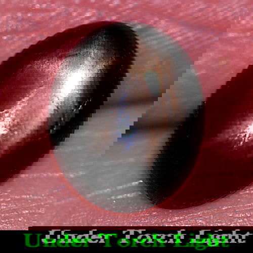 Natural Black Star Sapphire 3.47 Ct. Oval Cabochon Shape 9.6 x 8 Mm Gemstone From Thailand: Product ID: 806155199 Product Name: Natural Star Sapphire Weight: 3.47 CT. Size: 9.6 x 8 x 3.9 MM. Shape: Oval Cabochon Color: Black Clarity:Opaque Luster: Good 6 Rays Star Gems Origin: Thailand Treat