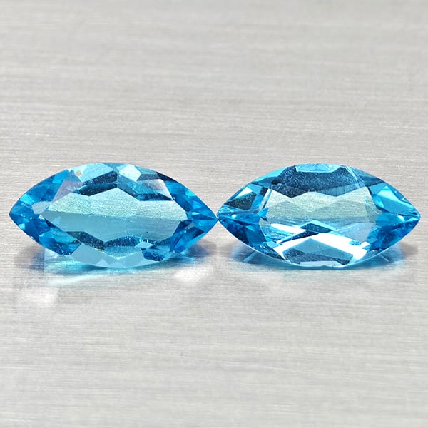 Natural Swiss Blue Topaz 2.34 Ct. 2 Pcs Marquise Shape 10.1 x 5.1 Mm Gemstones From Brazil: Product ID: 807168175 Product Name: Natural Blue Topaz Weight: 2.34 CT. Size: 10.1 x 5.1 x 3.4 MM. Shape: Marquise Shape Color: Swiss Blue Clarity:VSI Luster: Good Gems Origin: Brazil Treatment: Treat