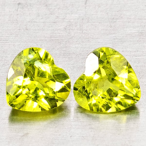 Natural Green Peridot 1.76 Ct. 2 Pcs Heart Shape 6.3 x 6.3 Mm Gemstones From Pakistan: Product ID: 805317314 Product Name: Natural Peridot Weight: 1.76 CT. Size: 6.3 x 6.3 x 3.8 MM. Shape: Heart Shape Color: Green Clarity:VSI - SI1 Luster: Good Gems Origin: Pakistan Treatment: Unheated