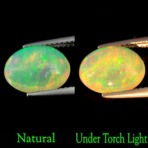 Natural Multi Color Opal 2.44 Ct. Oval Cabochon Shape 11 x 9.1 Mm. Unheated Gemstone: Product ID: 818726990 Product Name: Natural Opal Weight: 2.44 CT. Size: 11 x 9.1 x 5 MM. Shape: Oval Cabochon Color: Multi-Color Clarity:Semi - Transparent Luster: Good Gems Origin: Ethiopia Treatment