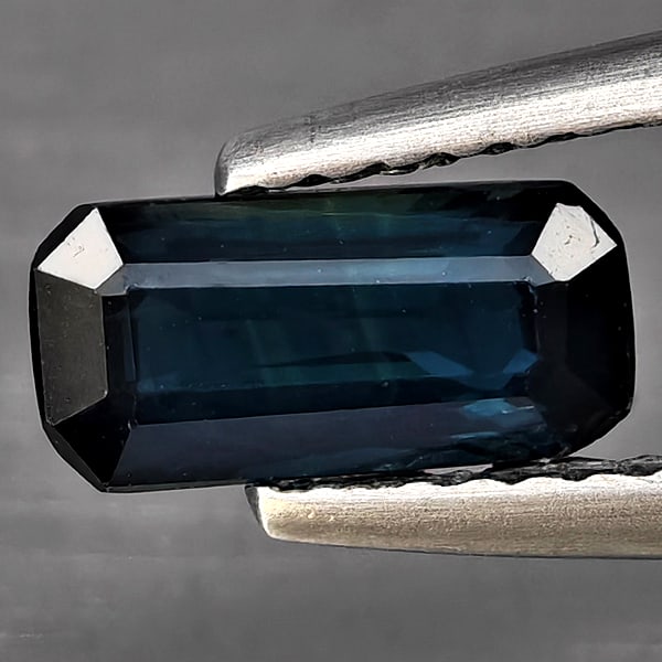 Natural Greenish Blue Sapphire 0.86 Ct. Octagon Shape 8.2 x 4 Mm Gemstones From Thailand: Product ID: 806130423 Product Name: Natural Green Sapphire Weight: 0.86 CT. Size: 8.2 x 4 x 2.9 MM. Shape: Octagon Color: Greenish Blue Clarity:SI1 Luster: Good Gems Origin: Thailand Treatment: Heated