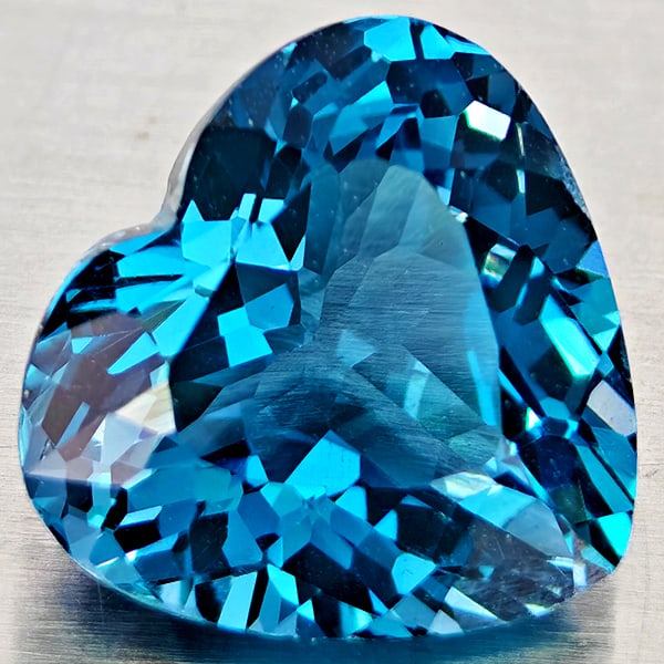 Natural London Blue Topaz 4.74 Ct. Heart Shape 10.9 x 10 Mm Gemstone From Brazil: Product ID: 807168383 Product Name: Natural Blue Topaz Weight: 4.74 CT. Size: 10.9 x 10 x 6.3 MM. Shape: Heart Shape Color: London Blue Clarity:VVS - VSI Luster: Good Gems Origin: Brazil Treatment: Tr