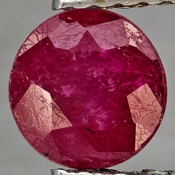 Natural Pinkish Red Ruby 1.07 Ct. Round Shape 5.8 Mm Gemstone From Madagascar: Product ID: 805935884 Product Name: Natural Ruby Weight: 1.07 CT. Size: 5.8 x 5.8 x 4 MM. Shape: Round Color: Pinkish Red Clarity:SI1 Luster: Good Gems Origin: Madagascar Treatment: Heated (Lead-glass