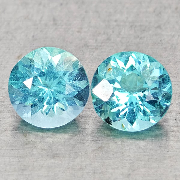 Natural Paraiba Color Apatite 0.91 Ct. 2 Pcs Round Shape 4.9 Mm Gemstones From Tanzania: Product ID: 800613633 Product Name: Natural Apatite Weight: 0.91 CT. Size: 4.9 x 4.9 x 3.1 MM. Shape: Round Color: Neon Blue Clarity:SI1 Luster: Good Gems Origin: Tanzania Treatment: Unheated Crystal