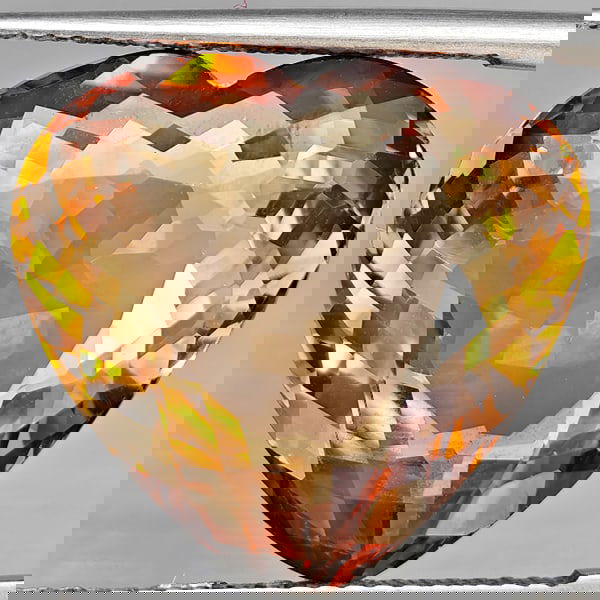 Natural Imperial Topaz 18.92 Ct. Heart Shape 18 x 16.8 Mm Gemstone From Brazil: Product ID: 807168595 Product Name: Natural Topaz Weight: 18.92 CT. Size: 18 x 16.8 x 8.5 MM. Shape: Heart Shape Color: Imperial Clarity:VSI Luster: Good Gems Origin: Brazil Treatment: Treated Crystal