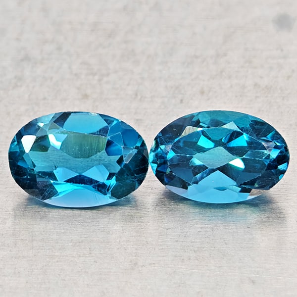 Natural London Blue Topaz 1.12 Ct. 2 Pcs Oval Shape 6 x 4.1 Mm Gemstones from Brazil: Product ID: 807168437 Product Name: Natural Blue Topaz Weight: 1.12 CT. Size: 6 x 4.1 x 2.8 MM. Shape: Oval Shape Color: London Blue Clarity:VSI - SI1 Luster: Good Gems Origin: Brazil Treatment: Treat