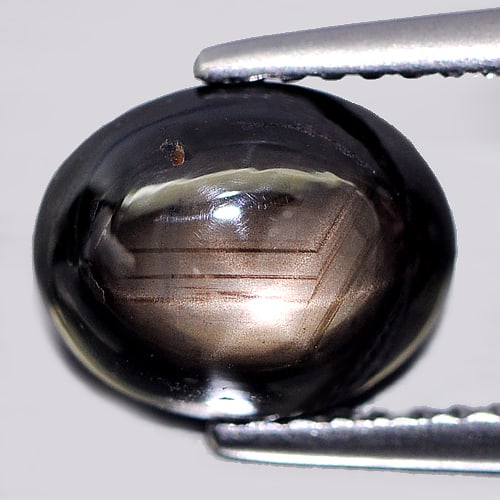 Natural Black Star Sapphire 3.41 Ct. Oval Cabochon Shape 9.1 x 7.3 Mm Gemstone from Thailand (1 of 3)