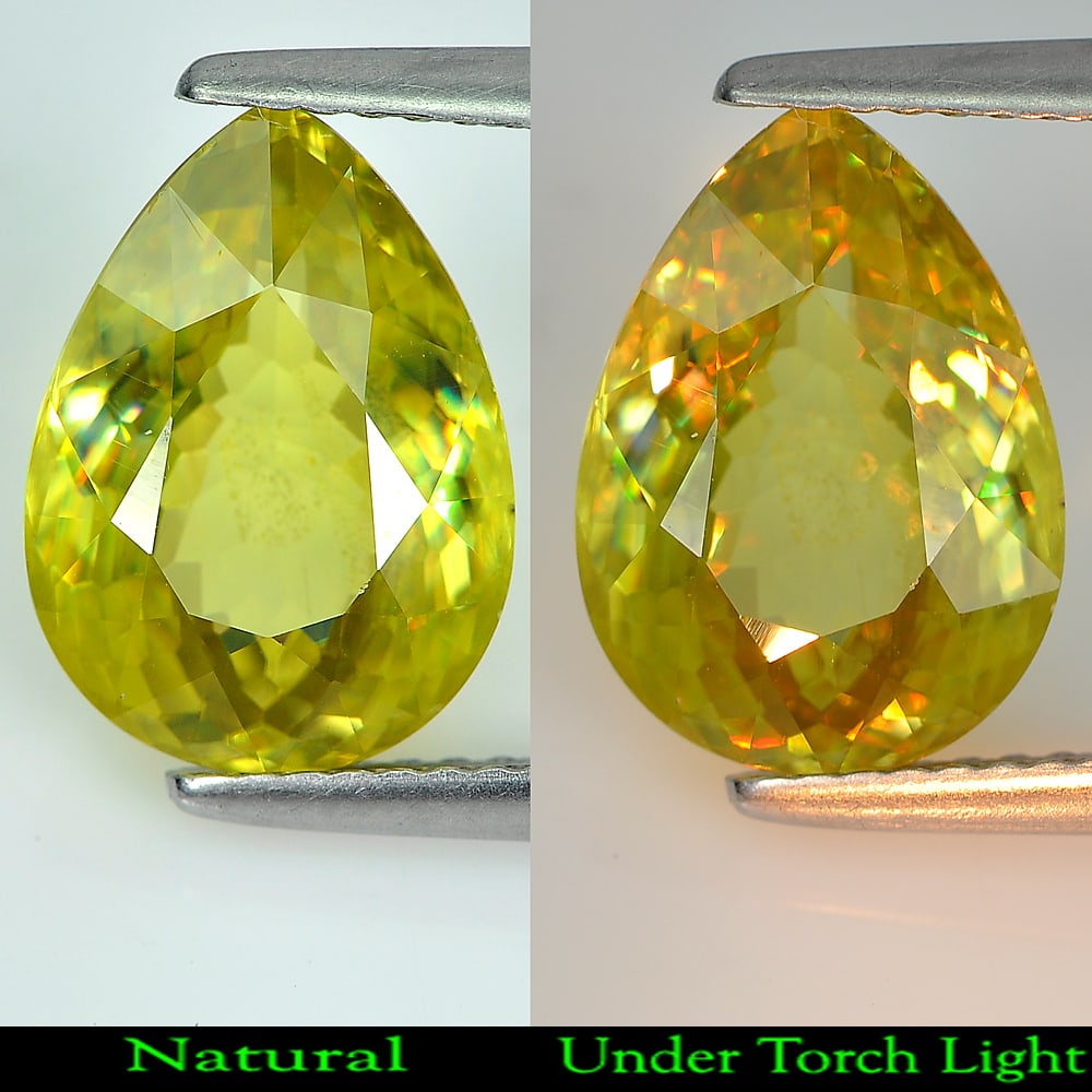 Natural Multi Color Sphene With Rainbow Spark 4.04 Ct. Pear Shape 12 x 8.8 Mm. Gemstone: Product ID: 806507984 Product Name: Natural Sphene Weight: 4.04 CT. Size: 12 x 8.8 x 5 MM. Shape: Pear Color: Yellow Green With Rainbow Spark Clarity:SI1 Luster: Adamantine Gems Origin: Madagascar Tre