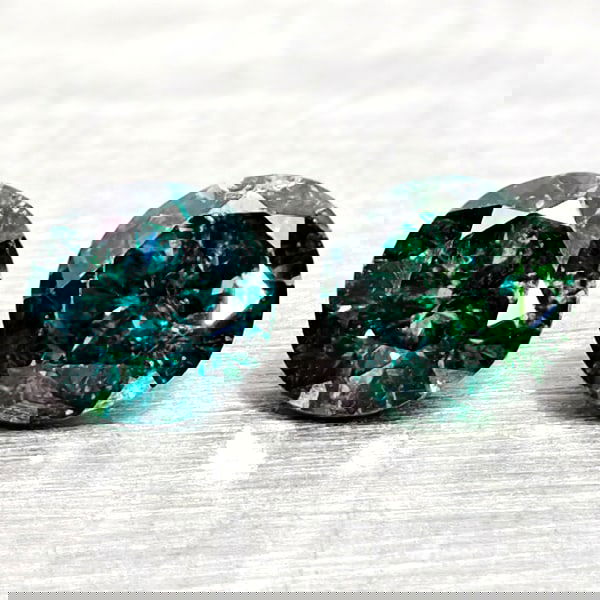 Natural Blue Loose Diamond 0.18 Ct. 2 Pcs Round Diamond Cut 2.7 Mm From Belgium: Product ID: 502100390 Product Name: Natural Natural Diamond Weight: 0.18 CT. Size: 2.7 x 2.7 x 1.8 MM. Shape: Round Diamond Cut Color: Blue Clarity:SI1 Luster: Good Gems Origin: Belgium Treatment: Tre