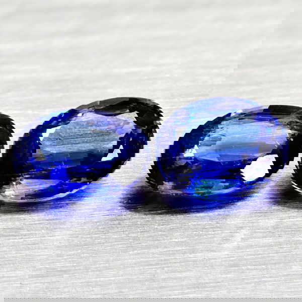 Natural Blue Kyanite 0.86 Ct. 2 Pcs Oval Shape Gemstones From Sri - Lanka: Product ID: 804204833 Product Name: Natural Kyanite Weight: 0.86 CT. Size: 5.2 x 3.9 x 2.2 to 5 x 4.1 x 2.5 MM. Shape: Oval Color: Blue Clarity:VSI - SI1 Luster: Good Gems Origin: Sri - Lanka Treatmen