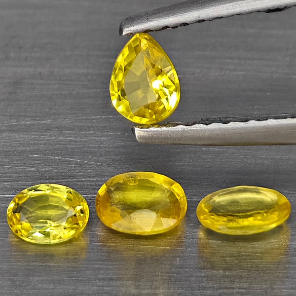 Natural Yellow Songea Sapphire 0.90 Ct. 4 Pcs Mixed Shape Gemstone From Tanzania: Product ID: 806130408 Product Name: Natural Yellow Sapphire Weight: 0.90 CT. Size: 4.5 x 3.5 x 2.4 to 3.9 x 3 x 1.7 MM. Shape: Mixed Shape Color: Yellow Clarity:SI1 Luster: Good Gems Origin: Tanzania