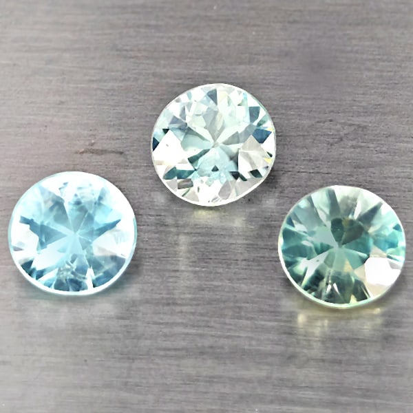 Natural Blue Zircon 2.45 Ct. 3 Pcs Round Diamond Cut Gemstone From Cambodia: Product ID: 807743242 Product Name: Natural Zircon Weight: 2.45 CT. Size: 5.6 x 5.6 x 3.3 to 5.4 x 5.4 x 3.3 MM. Shape: Round Diamond Cut Color: Blue Clarity:SI1 Luster: Good Gems Origin: Cambodia Tre