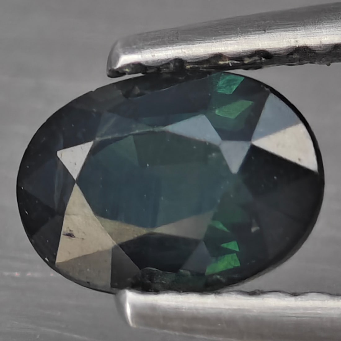 Natural Greenish Blue Sapphire 0.85 Ct. Oval Shape 6.7 x 4.8 Mm Gemstones From Thailand: Product ID: 806130418 Product Name: Natural Green Sapphire Weight: 0.85 CT. Size: 6.7 x 4.8 x 3 MM. Shape: Oval Shape Color: Greenish Blue Clarity:SI1 Luster: Good Gems Origin: Thailand Treatment: Hea
