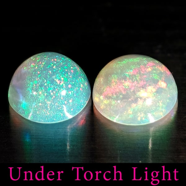 Natural Multi Color Opal 1.64 Ct. 2 Pcs Round Cabochon Shape 6.8 Mm Gemstones From Ethiopia: Product ID: 818728212 Product Name: Natural Opal Weight: 1.64 CT. Size: 6.8 x 6.8 x 3.9 MM. Shape: Round Cabochon Color: Multi-Color Clarity:Semi - Transparent Luster: Good Gems Origin: Ethiopia Treat