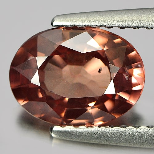 Natural Imperial Pink Zircon 2.09 Ct. Oval Shape 8.6 x 6.4 Mm Gemstone From Tanzania: Product ID: 807723831 Product Name: Natural Zircon Weight: 2.09 CT. Size: 8.6 x 6.4 x 3.6 MM. Shape: Oval Color: Imperial Pink Clarity:SI Luster: Good Gems Origin: Tanzania Treatment: Unheated Crystal