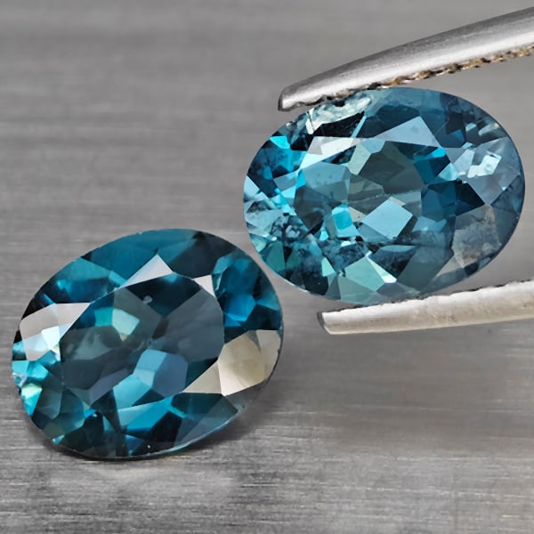 Natural London Blue Topaz 3.63 Ct. 2 Pcs Oval Shape 9.2 x 7.3 Mm Gemstones From Brazil: Product ID: 807168925 Product Name: Natural Blue Topaz Weight: 3.63 CT. Size: 9.2 x 7.3 x 4.5 MM. Shape: Oval Color: London Blue Clarity:SI1 Luster: Good Gems Origin: Brazil Treatment: Treated Crystal