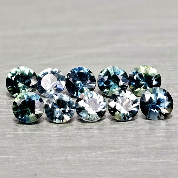 Natural Greenish Blue Sapphire 0.74 Ct. 10 Pcs Round Diamand Cut 2.7 Mm Gemstones From Tanzania: Product ID: 806162201 Product Name: Natural Green Sapphire Weight: 0.74 CT. Size: 2.7 x 2.7 x 1.6 MM. Shape: Round Diamond Cut Color: Fancy Color Clarity:VSI Luster: Very Good Gems Origin: Tanzania Tr