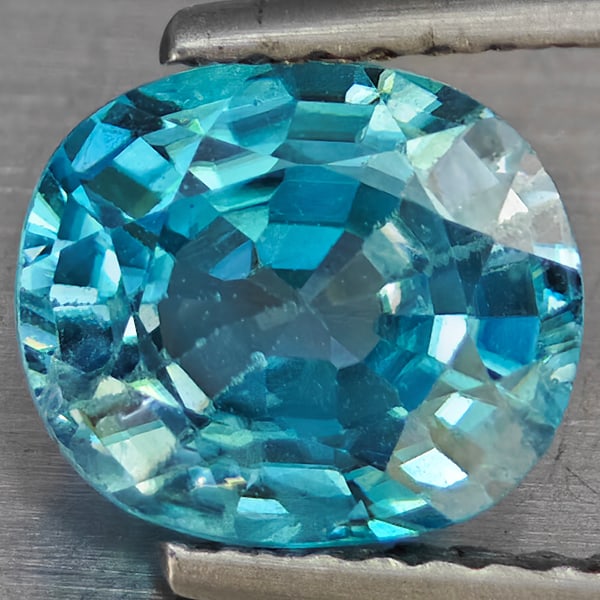 Natural Blue Zircon 2.25 Ct. Oval Shape 8 x 6.9 Mm Gemstone from Cambodia: Product ID: 807743072 Product Name: Natural Zircon Weight: 2.25 CT. Size: 8 x 6.9 x 4.1 MM. Shape: Oval Shape Color: Blue Clarity:VSI Luster: Good Gems Origin: Cambodia Treatment: Heated Crystal Struc