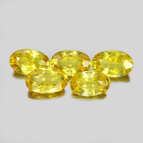 Natural Yellow Sapphire 1.51 Ct. 5 Pcs. Oval Shape 4.9 x 3 Mm. Gemstone From Thailand: Product ID: 806156091 Product Name: Natural Yellow Sapphire Weight: 1.51 CT. Size: 4.9 x 3 x 2.1 MM. Shape: Oval Color: Yellow Clarity:VSI Luster: Good Gems Origin: Thailand Treatment: Heated Crystal