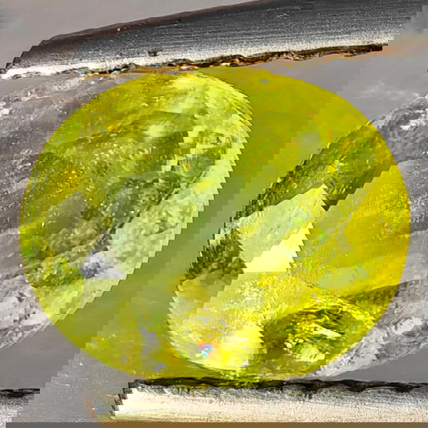 Natural Multi-Color With Rainbow Spark Sphene 1.18 Ct. Oval Shape 7.3 x 6.1 Mm Gemstone From: Product ID: 806509224 Product Name: Natural Sphene Weight: 1.18 CT. Size: 7.3 x 6.1 x 3.6 MM. Shape: Oval Shape Color: Multi-Color Clarity:SI1 Luster: Good Gems Origin: Madagascar Treatment: Unheated