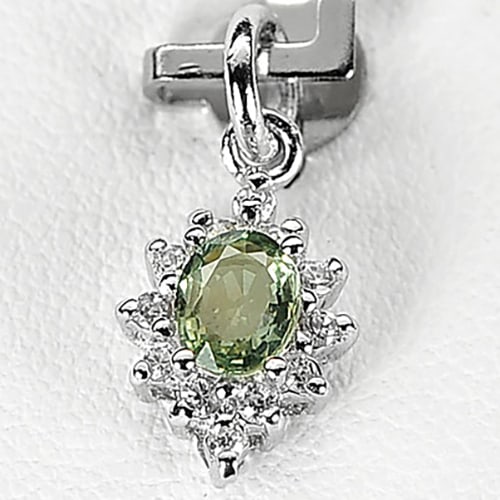 Natural Green Songea Sapphire Real 925 Sterling Silver Pendant 0.77 Grams Gemstone From Thailand: Product ID: 202100649 Product Type: 925 Sterling Silver Fine Jewelry Jewelry Weight: 0.77 Grams. Gemstones Color: Green Metal: Solid Silver 92.5%. Gemstone Detail: Center: Oval Green Songea Sapphire S