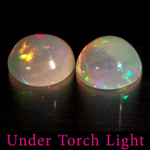 Natural Multi Color Opal 1.34 Ct. 2 Pcs Round Cabochon Shape 6.9 Mm Gemstones From Ethiopia: Product ID: 818728253 Product Name: Natural Opal Weight: 1.34 CT. Size: 6.9 x 6.9 x 3.4 MM. Shape: Round Cabochon Color: Multi-Color Clarity:Semi - Transparent Luster: Good Gems Origin: Ethiopia Treat