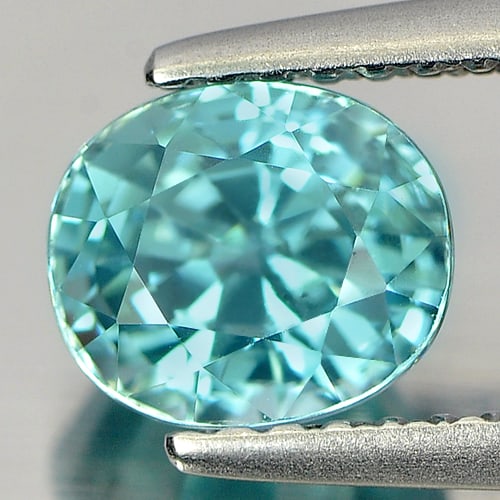 Natural Blue Zircon 1.97 Ct. Oval Shape 6.7 x 5.7 Mm Gemstone From Cambodia: Product ID: 807727010 Product Name: Natural Zircon Weight: 1.97 CT. Size: 6.7 x 5.7 x 5 MM. Shape: Oval Color: Blue Clarity:VSI Luster: Good Gems Origin: Cambodia Treatment: Heated Crystal Structure: