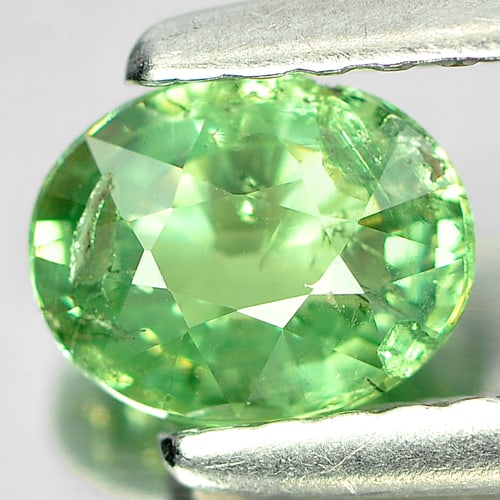 Natural Green Demantoid Garnet 0.65 Ct. Oval Shape 5.9 x 4.7 Mm. Unheated Gemstone: Product ID: 802912864 Product Name: Natural Demantoid Weight: 0.65 CT. Size: 5.9 x 4.7 x 2.8 MM. Shape: Oval Color: Green Clarity:SI Luster: Good Gems Origin: Madagascar , Africa Treatment: Unheated C