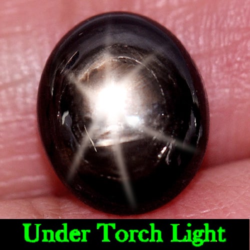 Natural Black Star Sapphire 3.80 Ct. Oval Cabochon Shape 9.6 x 8 Mm Gemstone from Thailand: Product ID: 806132968 Product Name: Natural Star Sapphire Weight: 3.80 CT. Size: 9.6 x 8 x 4.4 MM. Shape: Oval Cabochon Color: Black Clarity:Opaque Luster: Good 6 Rays Star Gems Origin: Thailand Treat