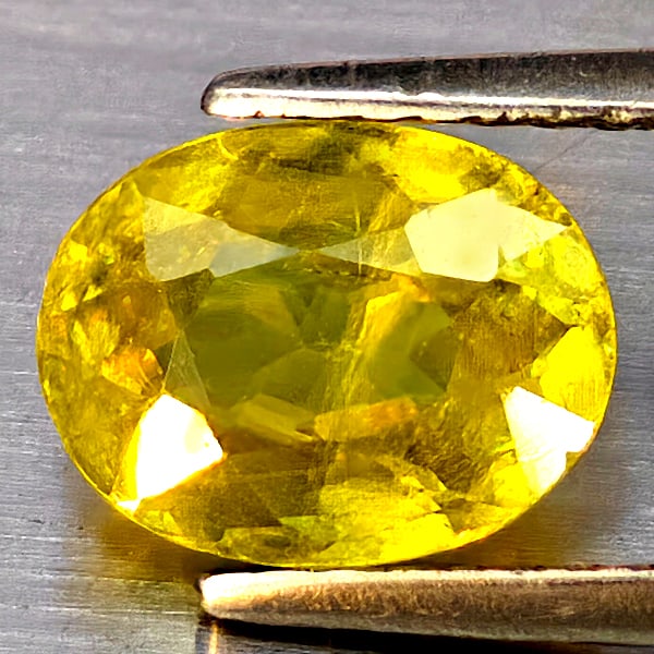 Natural Multi Color Sphene Rainbow Spark 1.86 Ct. Oval Shape 8.2 x 6.5 Mm Gemstone From Madagascar (1 of 3)