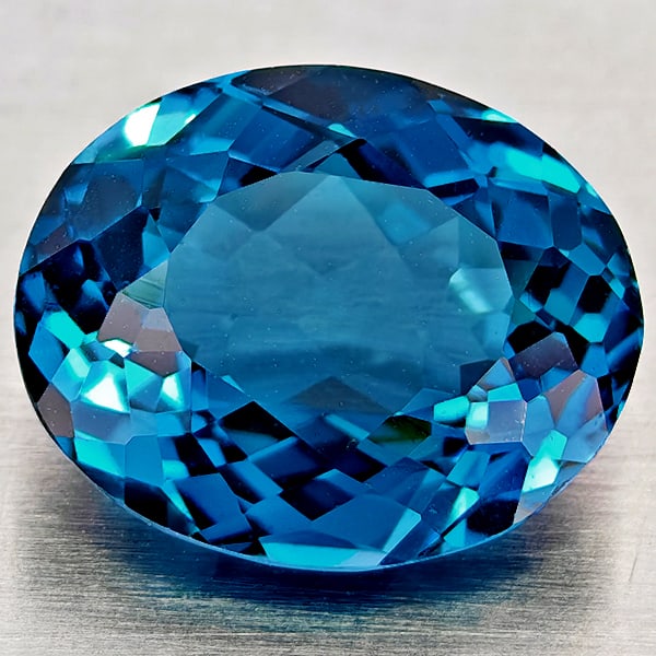 Natural London Blue Topaz 4.36 Ct. Oval Shape 11.1 x 9 Mm Gemstone From Brazil: Product ID: 807168397 Product Name: Natural Blue Topaz Weight: 4.36 CT. Size: 11.1 x 9 x 5.4 MM. Shape: Oval Shape Color: London Blue Clarity:VVS - VSI Luster: Good Gems Origin: Brazil Treatment: Trea
