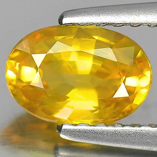 Natural Yellow Color Sapphire 1.01 Ct. Oval Shape 7 x 4.8 Mm Gemstone From Sri Lanka: Product ID: 806156418 Product Name: Natural Yellow Sapphire Weight: 1.01 CT. Size: 7 x 4.8 x 3.2 MM. Shape: Oval Color: Yellow Clarity:VSI Luster: Good Gems Origin: Ceylon, Sri - Lanka Treatment: Heat