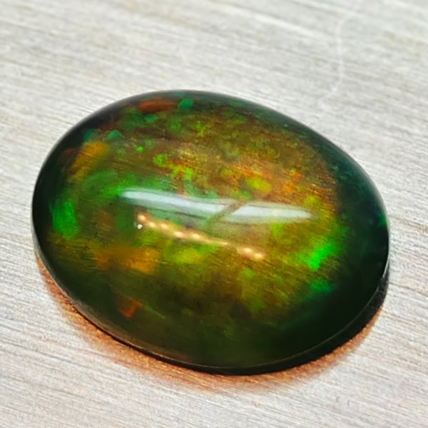 Natural Multi-Color Opal 1.25 Ct. Oval Cabochon Shape 9 x 7 Mm Gemstone From Ethiopia (1 of 3)
