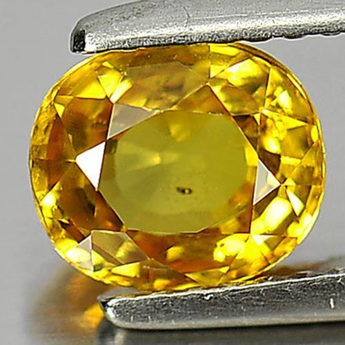 Natural Yellow Sapphire 1.47 Ct. Oval Shape 6.9 x 6 Mm. Gemstone From Thailand (1 of 3)