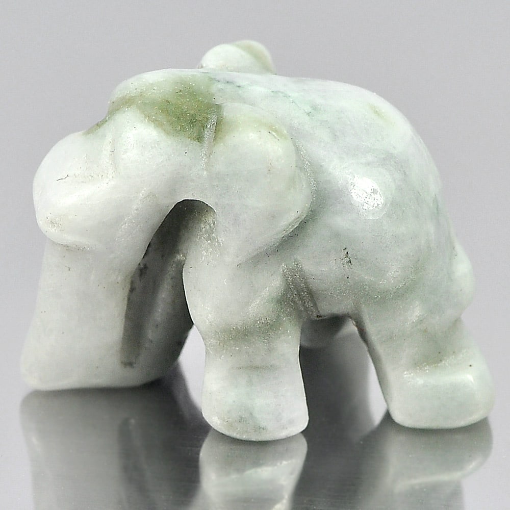 Natural Green White Jade 46.32 Ct. Elephant Carving Shape 25 x 18 Mm. Gemstone From Thailand: Product ID: 819813014 Product Name: Natural Jade Weight: 46.32 CT. Size: 25 x 18 x 15 MM. Shape: Elephant Carving Color: Green Clarity:Opaque Luster: Good Gems Origin: Thailand Treatment: Unheated Cry