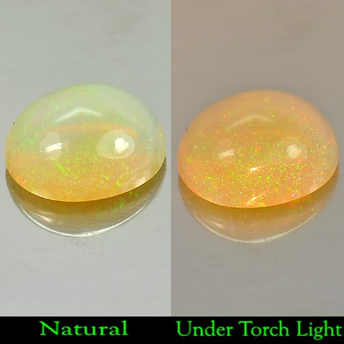 Natural Multi Color Opal 2.17 Ct. Oval Cabochon Shape 10.2 x 8.5 Mm. Unheated Gemstone: Product ID: 818712901 Product Name: Natural Opal Weight: 2.17 CT. Size: 10.2 x 8.5 x 5.2 MM. Shape: Oval Cabochon Color: Multi Color Clarity:Semi - Transparent Luster: Good Gems Origin: Ethiopia Treat