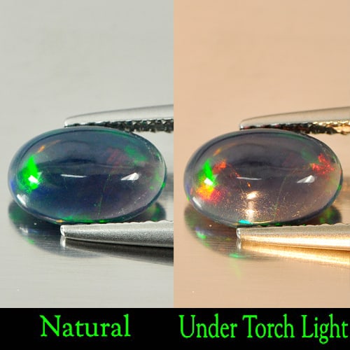 Natural Fire Red Black Opal 0.73 Ct. Oval Cabochon Shape 8.9 x 6 Mm. Gemstone: Product ID: 818724376 Product Name: Natural Opal Weight: 0.73 CT. Size: 8.9 x 6 x 3.2 MM. Shape: Oval Cabochon Color: Rainbow Fire Red Black Clarity:Semi - Transparent Luster: Iridescent Gems Origin: