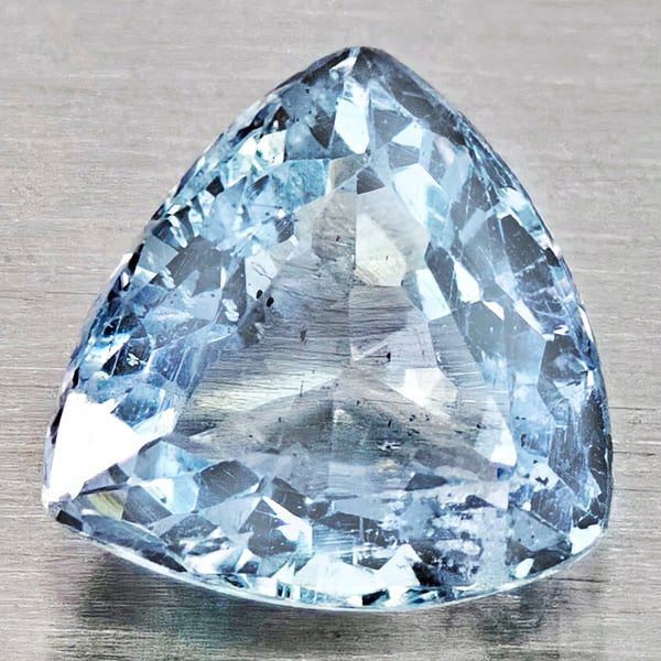 Natural Light Blue Aquamarine 1.20 Ct. Trilliant Shape 7.1 x 6.9 Mm Gemstone From Brazil: Product ID: 800812076 Product Name: Natural Aquamarine Weight: 1.20 CT. Size: 7.1 x 6.9 x 4.2 MM. Shape: Trilliant Color: Light Blue Clarity:VSI - SI1 Luster: Good Gems Origin: Brazil Treatment: Unhea