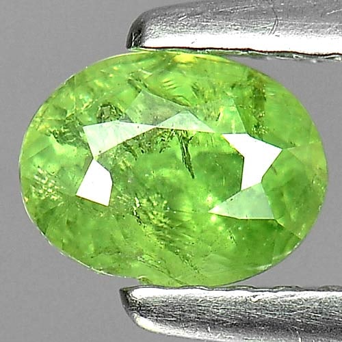 Natural Green Demantoid Garnet 0.80 Ct. Oval Shape 5.9 x 4.5 Mm Gemstone From Madagascar: Product ID: 802919286 Product Name: Natural Demantoid Weight: 0.80 CT. Size: 5.9 x 4.5 x 3.8 MM. Shape: Oval Color: Green Clarity:SI Luster: Good Gems Origin: Madagascar , Africa Treatment: Unheated C