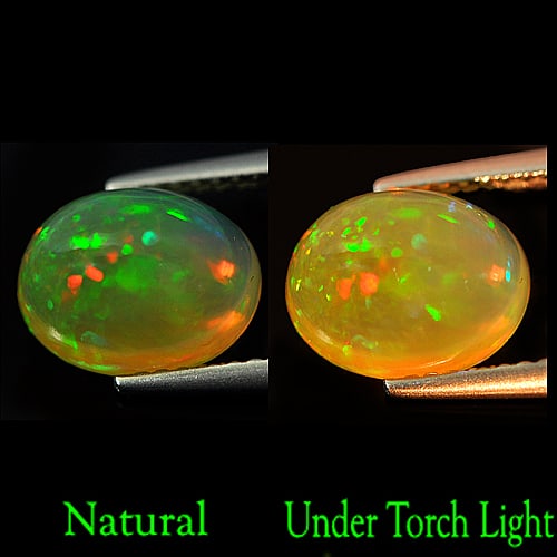 Natural Multi Color Opal 2.07 Ct. Oval Cabochon Shape 9.8 x 8 Mm. Unheated Gemstone: Product ID: 818727029 Product Name: Natural Opal Weight: 2.07 CT. Size: 9.8 x 8 x 5.4 MM. Shape: Oval Cabochon Color: Multi-Color Clarity:Semi - Transparent Luster: Iridescent Gems Origin: Ethiopia Tr