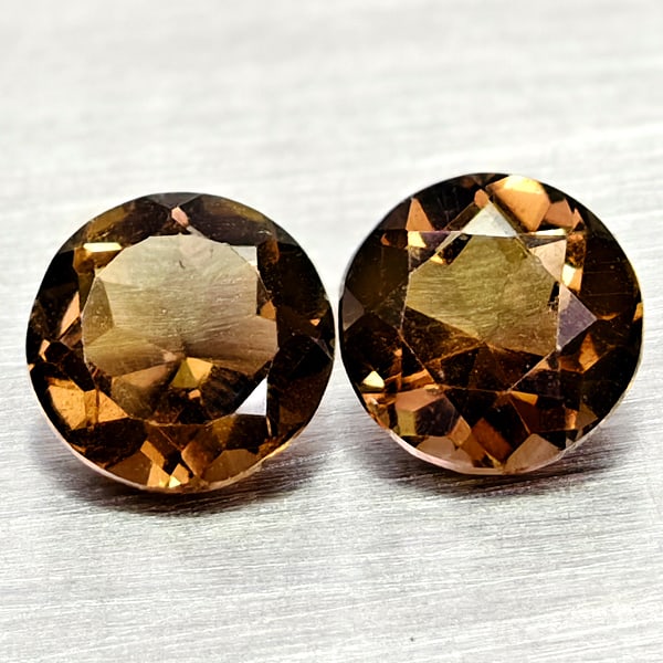 Natural Smokey Quartz 1.23 Ct. 2 Pcs Round Shape 5.7 Mm Gemstones From Brazil: Product ID: 805529927 Product Name: Natural Quartz Weight: 1.23 CT. Size: 5.7 x 5.7 x 3.7 MM. Shape: Round Color: Smokey Clarity:VSI Luster: Good Gems Origin: Brazil Treatment: Unheated Crystal Struct