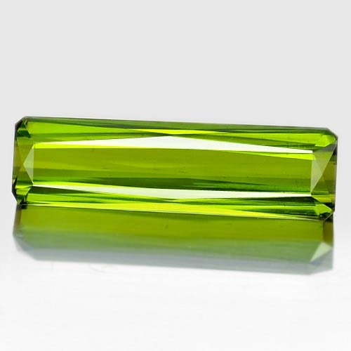 Natural Green Tourmaline 12.11 Ct. VVS Octagon Shape 25 x 7.3 Mm. Gemstone Unheated From Nigeria: Product ID: 807239305 Product Name: Natural Tourmaline Weight: 12.11 CT. Size: 25 x 7.3 x 6.3 MM. Shape: Octagon Color: Green Clarity:VVS Luster: Very Good Gems Origin: Nigeria Treatment: Unheated Cry