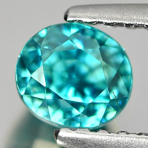 Natural Blue Zircon 1.13 Ct. Oval Shape 5.4 x 4.8 Mm Gemstone from Cambodia: Product ID: 807713114 Product Name: Natural Zircon Weight: 1.13 CT. Size: 5.4 x 4.8 x 4.9 MM. Shape: Oval Color: Blue Clarity:VVS Luster: Good Gems Origin: Cambodia Treatment: Heated Crystal Structure
