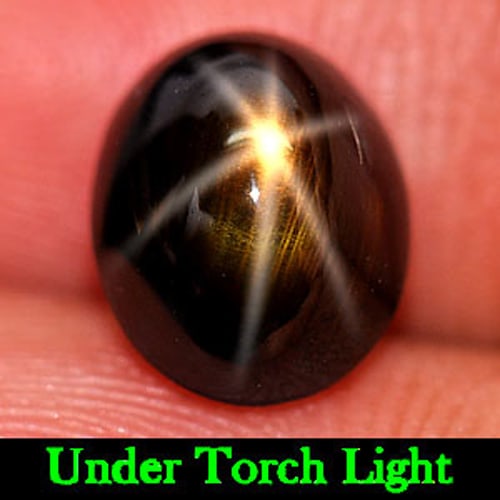 Certified Natural Golden Star Sapphire 6 Ray 4.44 Ct. Oval Cabochon Shape 7.43 x 9.02 Mm. Gemstone: Product ID: 806149941 / Product Name: Natural Star Sapphire / Weight: 4.44 CT. / Size: 7.43 x 9.02 x 6.34 MM. / Shape: Oval Cabochon / Color: Yellow / Clarity:Opaque / Luster: Good 6 Ray Star / Gems O
