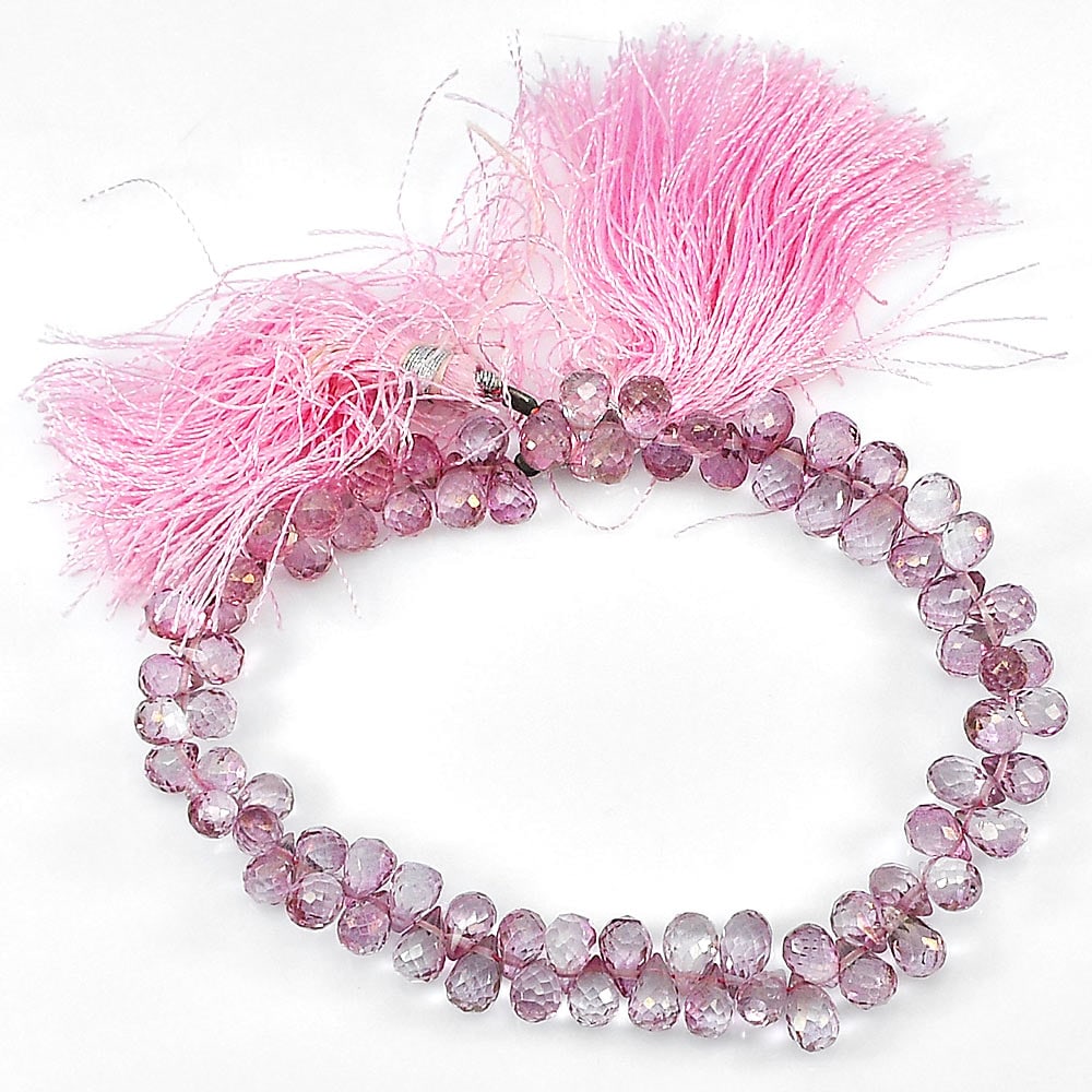 Natural Pink Topaz Beads 102.10 Ct. Briolette Shape 7.4 x 5 Mm. Gemstone Length 8 Inch: Product ID: 807136425 Product Name: Natural Topaz Weight: 102.10 CT. Size: 8 Inch / 7.4 x 5 x 5 MM. Shape: Briolette With Drilled Color: Pink Clarity:IF - VVS Luster: Good Gems Origin: Brazil Treatmen